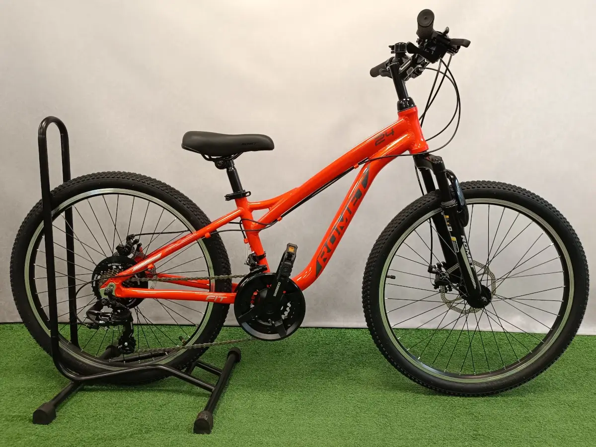 trabike_rower_gorski_mtb_mlodziezowy_romet_rambler_fit_24_pomaranczowy_1.webp