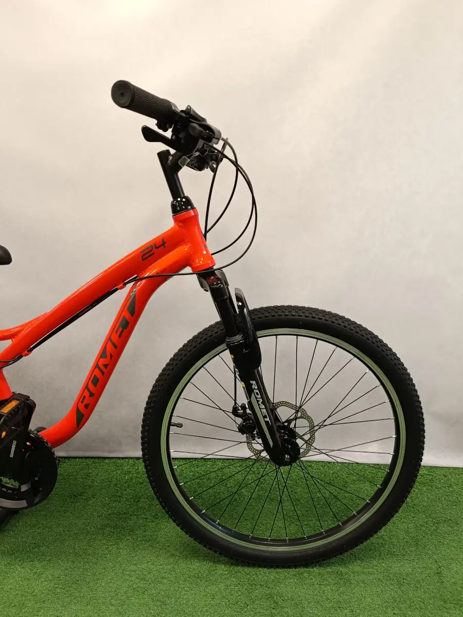 trabike_rower_gorski_mtb_mlodziezowy_romet_rambler_fit_24_pomaranczowy_2.webp